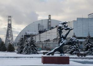 A general view shows a New Safe Confinement structure over the old sarcophagus covering the damaged fourth reactor at the Chernobyl nuclear power plant, in Chernobyl