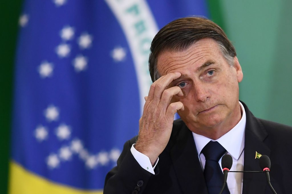 Brazilian President Jair Bolsonaro delivers a speech during the appointment ceremony of the new heads of public banks, at Planalto Palace in Brasilia on January 7, 2019. - Brazil's Finance Minister Paulo Guedes appionted the new presidents of the country's public banks (Photo by EVARISTO SA / AFP) ORG XMIT: ESA037