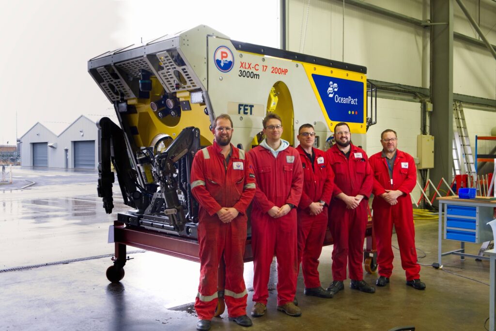 FET staff stand in front of ROV